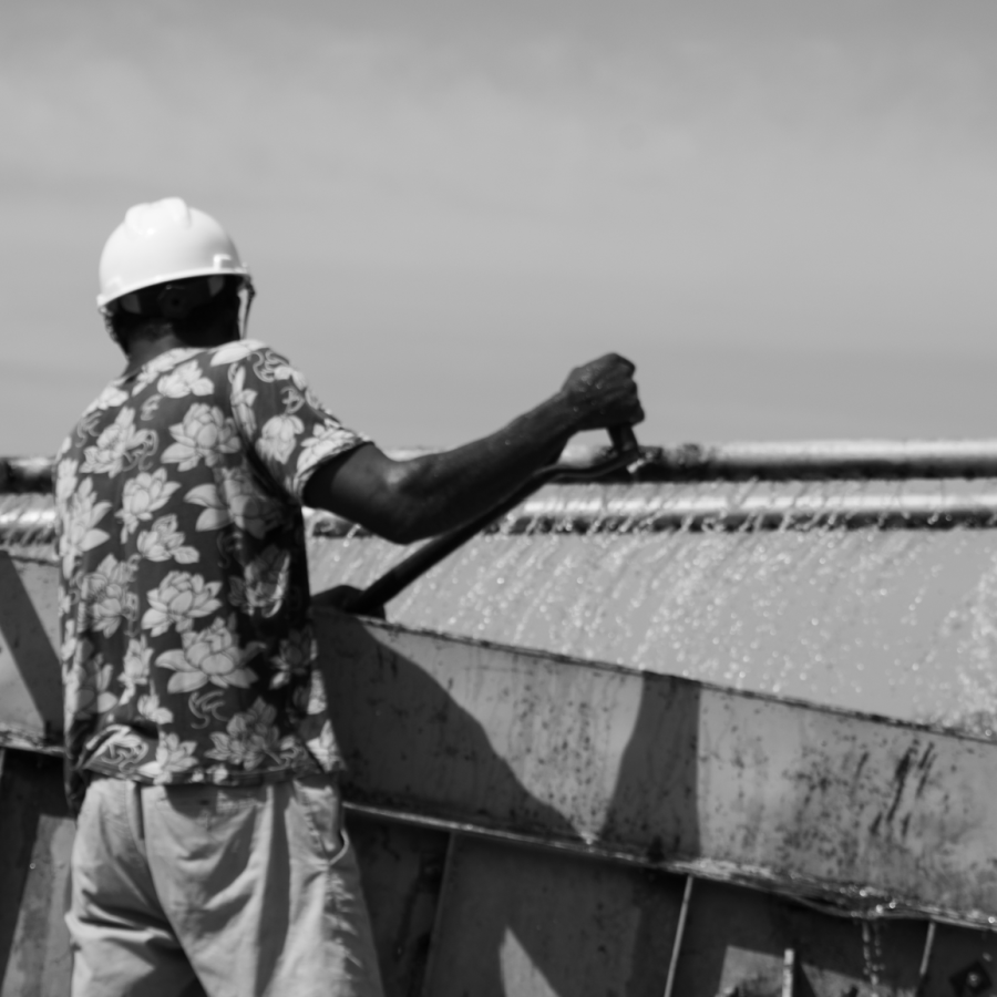 Worker Adjusting Water Pressure